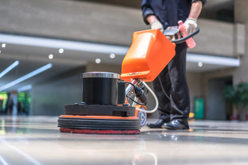 cleaning floor with machine