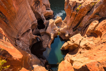 A view looking down on the the plunge pools at Bourke’s Luck Potholes in Mpumalanga, South Africa; a geological formation carved out by the movement of water