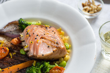 Grilled Salmon Fillet with Vegetables on White Plate