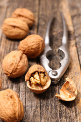 walnut on wood background