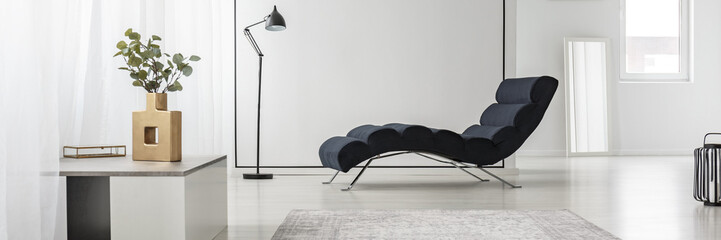 Chaise lounge in white interior - Powered by Adobe