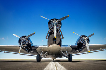 historical aircraft on a runway