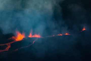 Fototapeta na wymiar The Piton de la Fournaise volcano during an eruption in Reunion Island