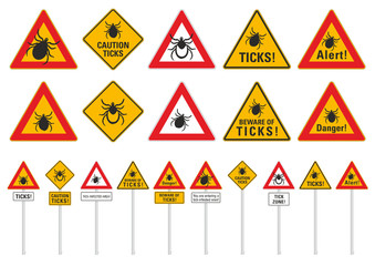 Different versions of signs warn against ticks, TBE and Lyme disease