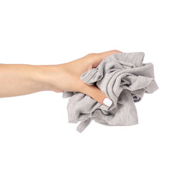 Crumpled gray shirt in hand clothes fabric on white background isolation