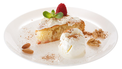 Apple biscuit cake and ice cream on plate isolated on white background