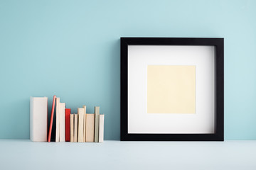 Photo frame and mini old books.