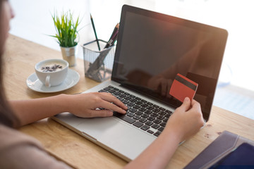 Fototapeta premium Woman shopping online blank screen