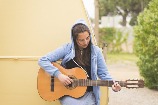 Woman playing guitar