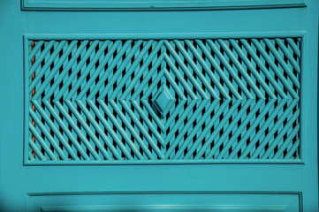 Detail of wooden blue door decoration in Paraty, an amazing and historic town totally preserved in the coast of the Rio de Janeiro State, southwestern Brazil