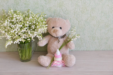 expectation of the newborn. a baby shower for a pregnant celebration, a bear a bottle of milk