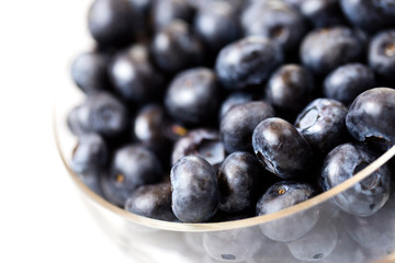 Fresh blueberries in bowl.