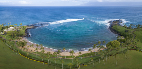 This is a three image aerial panoramic of stunning Kapalua Bay on the Hawaiian Island of Maui.