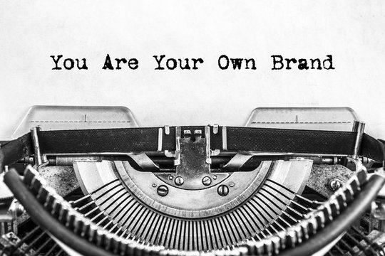 You Are Your Own Brand text typed on a vintage typewriter, old paper. close-up