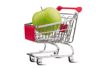 small aluminum shopping cart with green apple on white background
