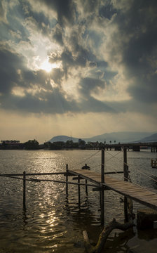 pier and river view at sunset in kampot town cambodia