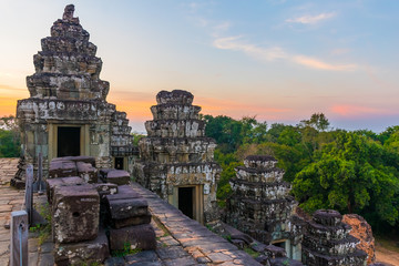 Sunset at Phnom Bakheng Temple in Angkor Wat Complex in Cambodia.