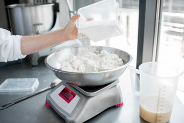 Weighing ingredients for baking with professional scales