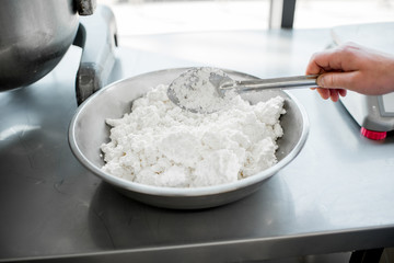 Weighing ingredients for baking with professional scales
