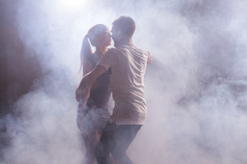 Young love couple dancing social danse kizomba or bachata.