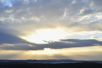 The view of the sunset and big cloud.