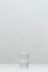Full water glass in a studio