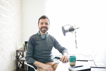 Male broadcaster at online radio station