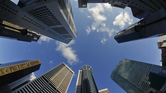 Low angle view of Banks and Commercial buildings in Singapore's CBD, Central Business District, Singapore, South East Asia, Time lapse