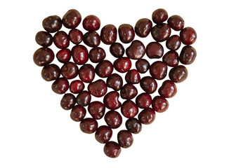 Sweet ripe cherry berry in heart shape isolated on white background.. Sweet love concept.