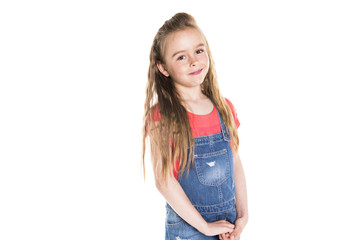 Fototapeta premium Portrait of a cute 7 years old girl Isolated over white background