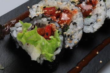 Sushi rolls served on a plate