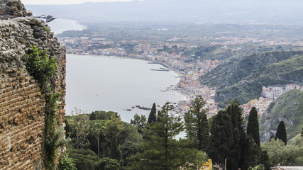 view of the city from the Ancient greek amphitheater in Taormina, Sicily, Italy