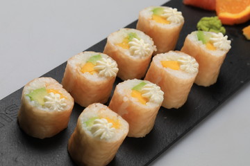 Yellow and orange sushi rolls