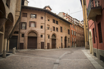 Fototapeta na wymiar Medieval street portico in Bologna, Italy