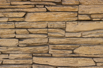 gray brown uneven brick wall pattern