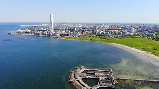 Aerial view of cityscape of Malmo, capital city of Scania, skyline of modern downtown, seascape of Baltic Sea and Ribersborg Beach area - landscape of Sweden from above, Scandinavia, Europe, 4k UHD