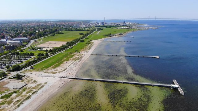 Aerial view of  Malmo, capital city of Scania seascape of Baltic Sea and Ribersborg Beach area - landscape of Sweden from above, Scandinavia, Europe, 4k UHD