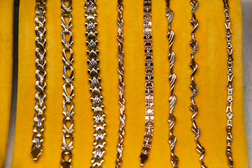 Golden accessories in a jewelery store