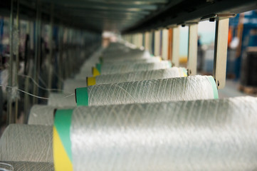 Yarn thread running in the machine