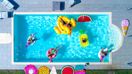Friends having fun in a swimming pool