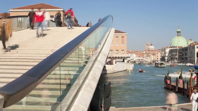 T/L WS People cross the new modern design Ponte di Calatrava Bridge, Grand Canal, Venice, Veneto, Italy