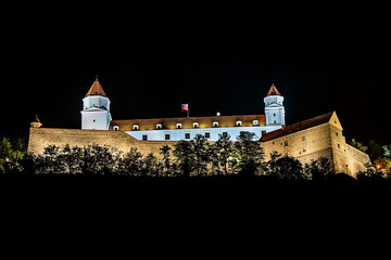 Naklejka premium Bratislava, Slovakia May 23, 2018: Bratislava Castle or Bratislavsky Hrad is the main castle of Bratislava, capital of Slovakia by night. Bratislava Castle is located on rocky hill.