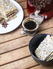 cookies with seeds, coffee, on a wooden background