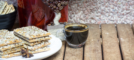 cookies with seeds, coffee, on a wooden background
