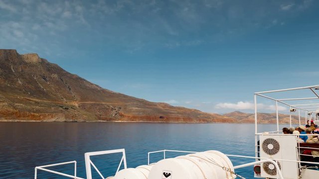 Day timelapse of a boat cruise along Greek islands in the Mediterranean on a sunny day