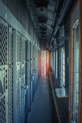 The corridor of the prison car. Transport for prisoners, the view from the inside. Bars on the Windows and doors. The interior of the prison train.