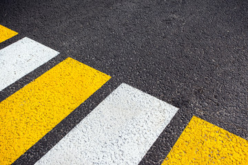 marking of the pedestrian crossing on the new asphalt, background texture