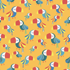 toucan birds blue red white yellow seamless pattern seamless pattern. Great for kids market, fabric design, wallpaper, scrap booking. Vector surface pattern design.