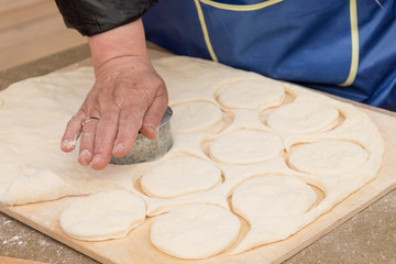 Woman prepares biscuits