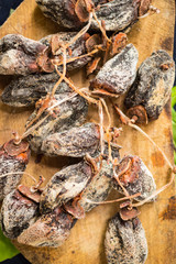 Bunch of sweet dried persimmons. Traditional asian sweet snack, middle east dessert dried on sun and contains a lot of organic sugar. Raw vegan vegetarian healthy food.